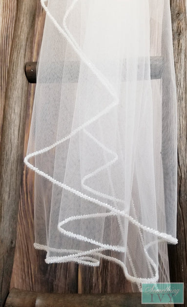 http://somethingivy.com/cdn/shop/products/38-frost-beaded-edge-veil-beaded-veils-beaded-edge-frosted-white-beaded-edge-opaque-beaded-veil_1200x630.jpg?v=1565580280