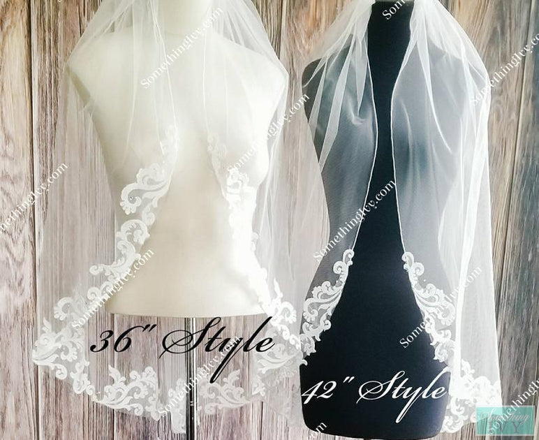 http://somethingivy.com/cdn/shop/products/baroque-lace-fingertip-wedding-veil-with-a-rolled-edge-3_1200x630.jpg?v=1600701806