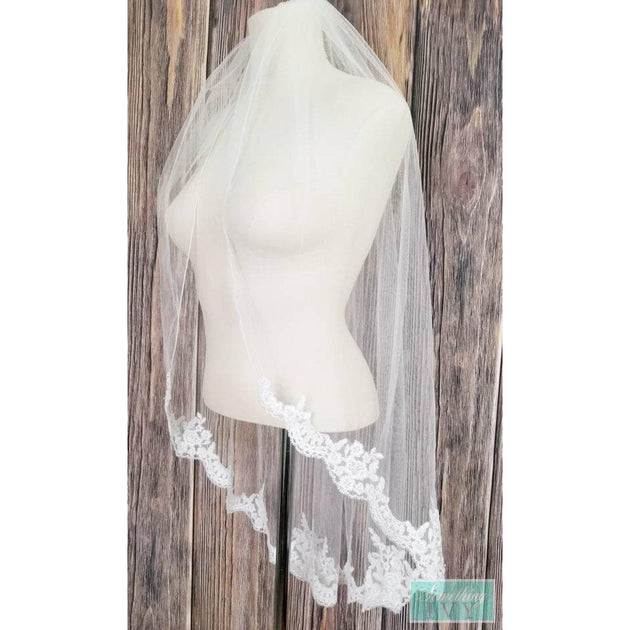 http://somethingivy.com/cdn/shop/products/choose-length-alencon-beaded-wedding-veil_1200x630.jpg?v=1564837101