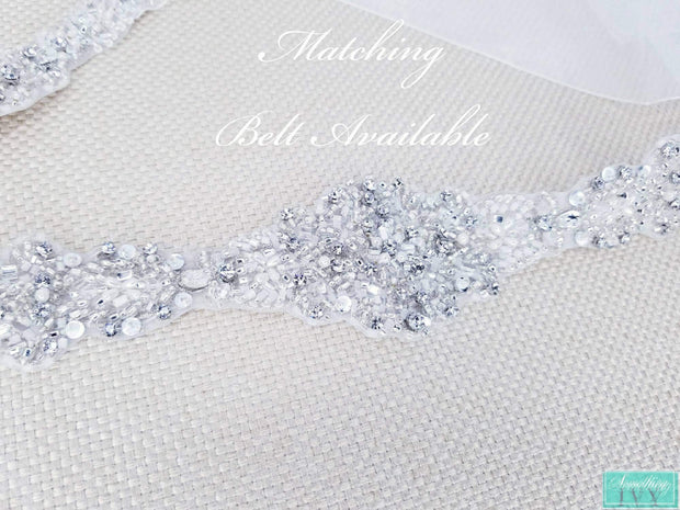 https://somethingivy.com/cdn/shop/products/108-frost-beaded-cathedral-edge-veil-beaded-veils-beaded-edge-frosted-white-beaded-edge-opaque-beaded-veil-cathedral-3_620x.jpg?v=1596913477