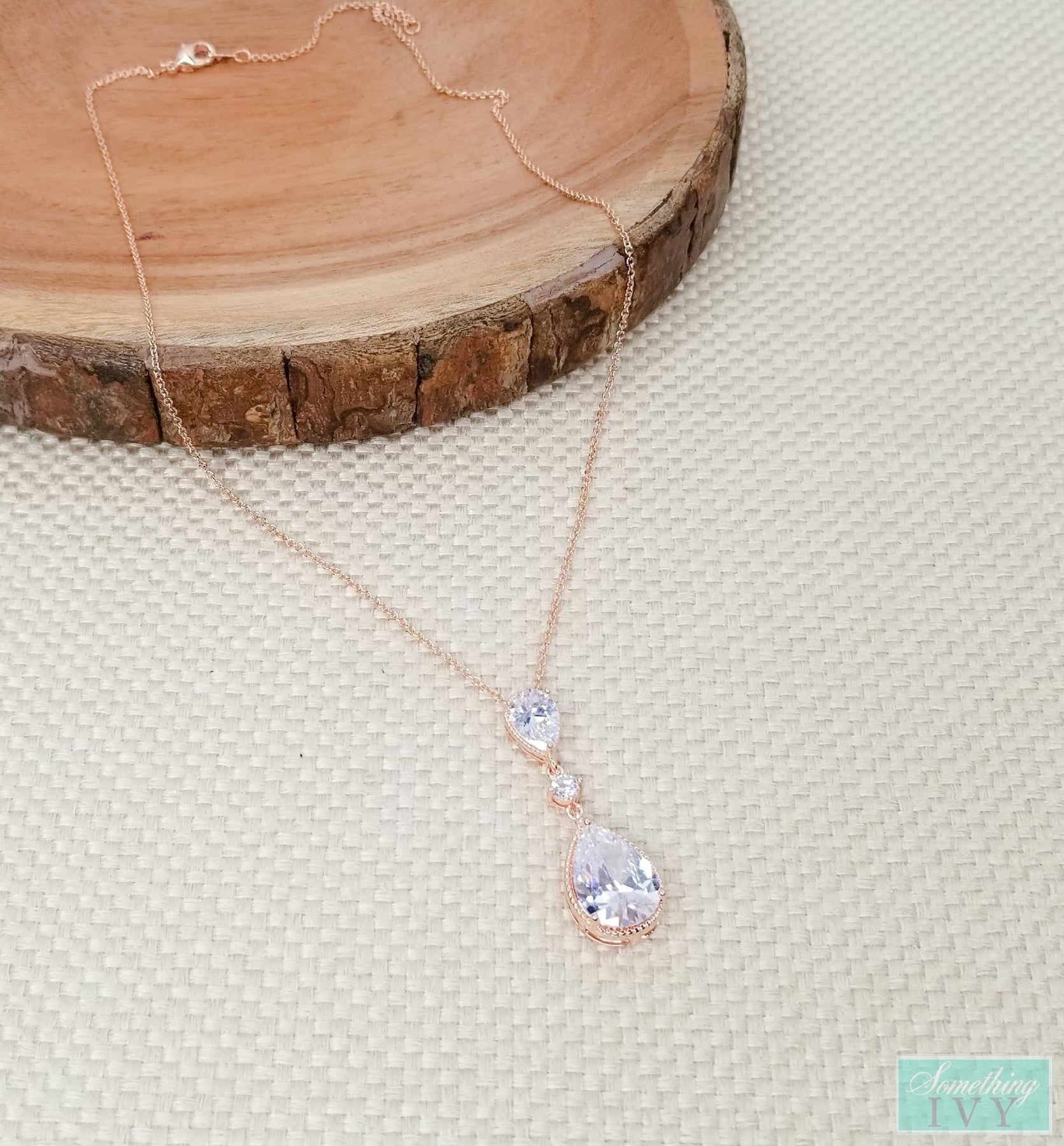 Rose gold pear shaped on sale necklace